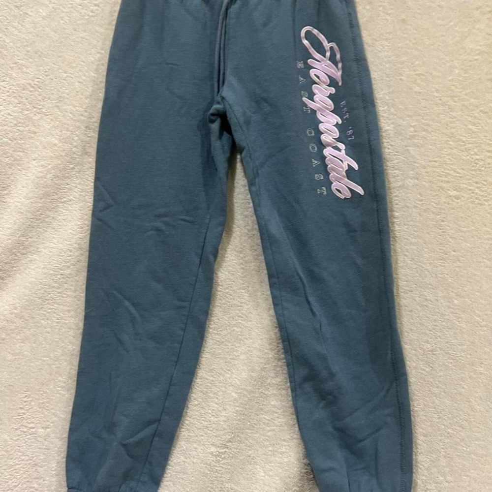 blue Aeropostale sweatpants with purple logo size medium